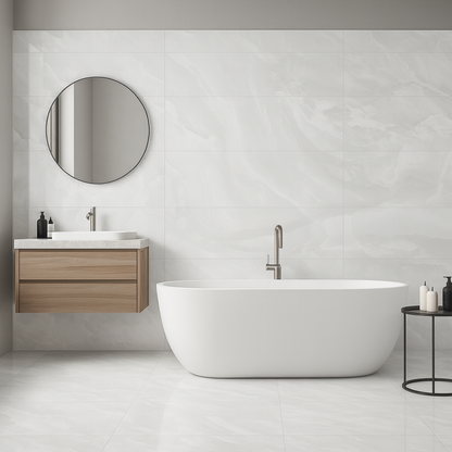 Modern bathroom with a freestanding bathtub, wooden vanity, and round mirror.